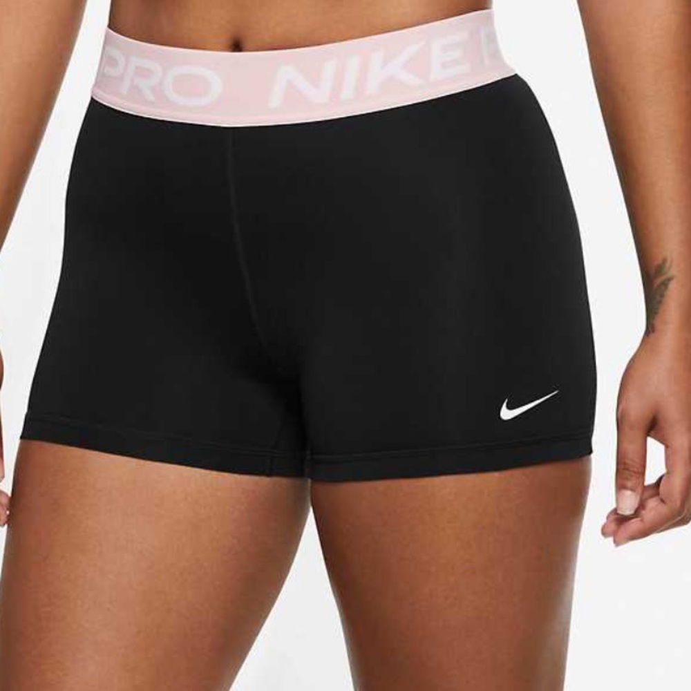 Black Nike pro spandex shorts with pink band size small women’s